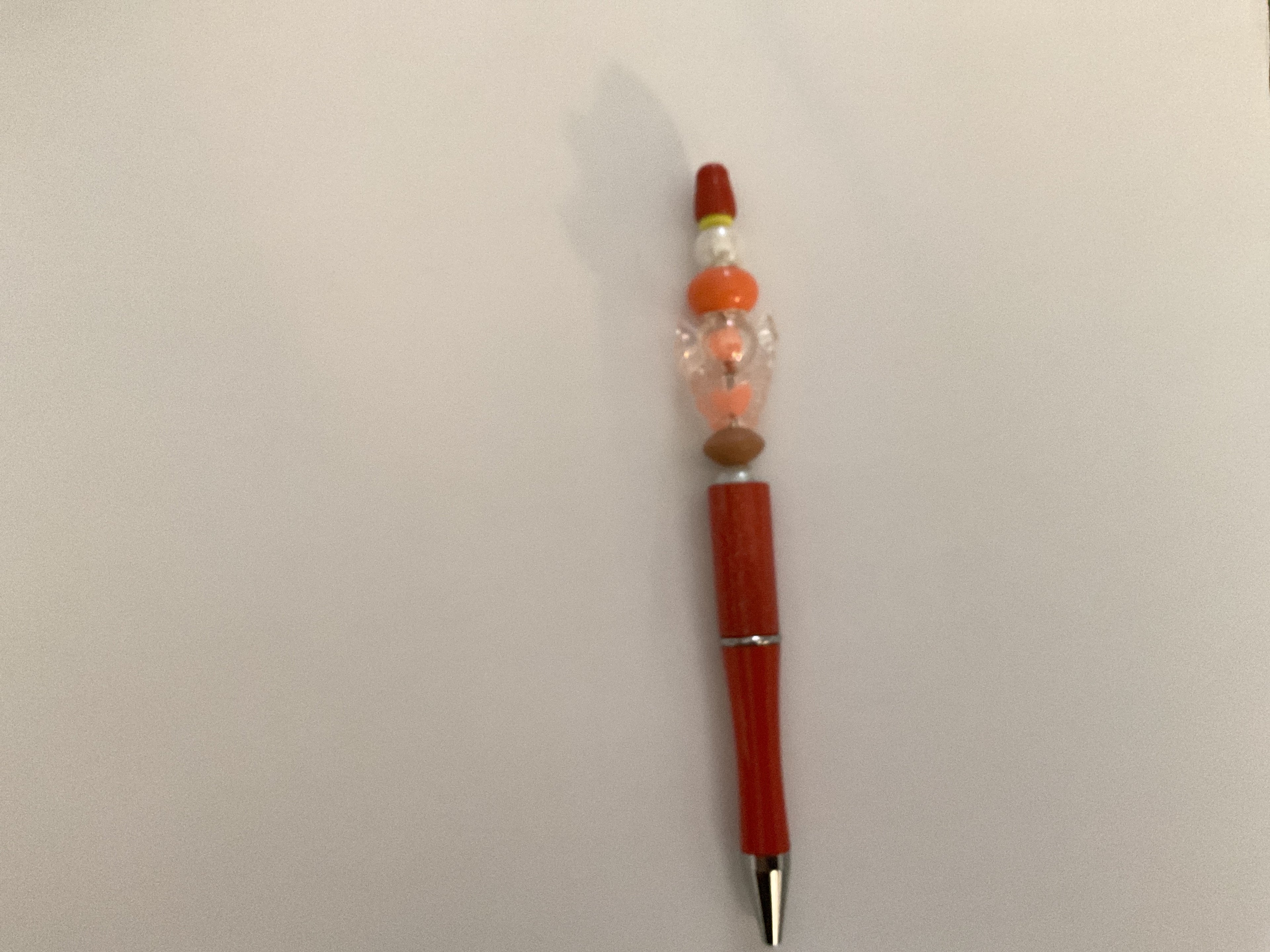 Orange beaded pen