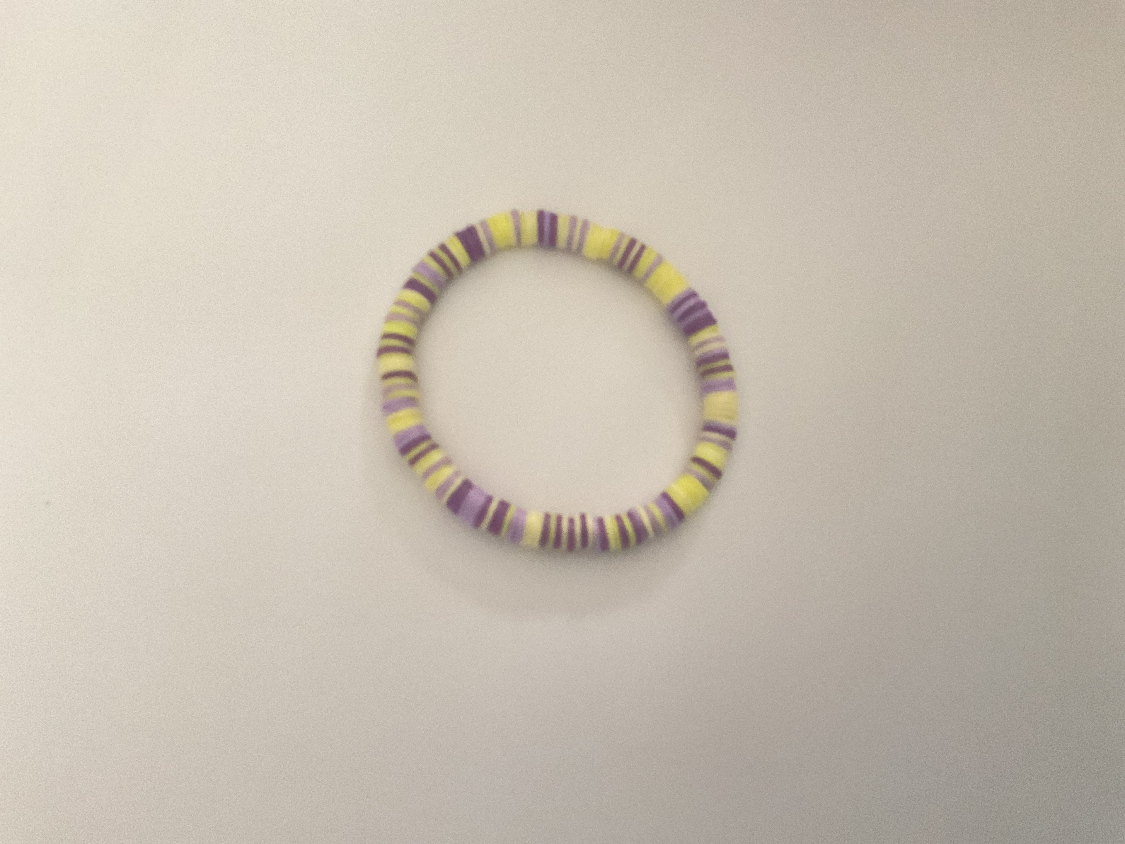 Purple yellow clay bead bracelet